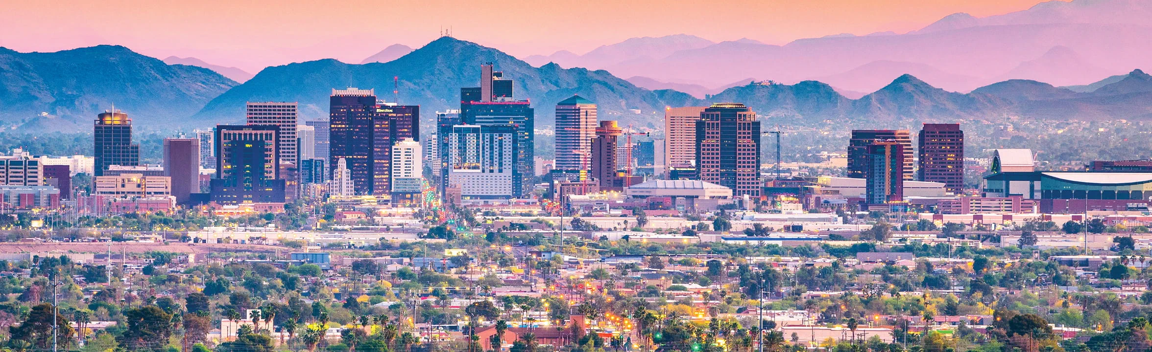 Phoenix skyline at sunset – Division 1 Plumbing banner image